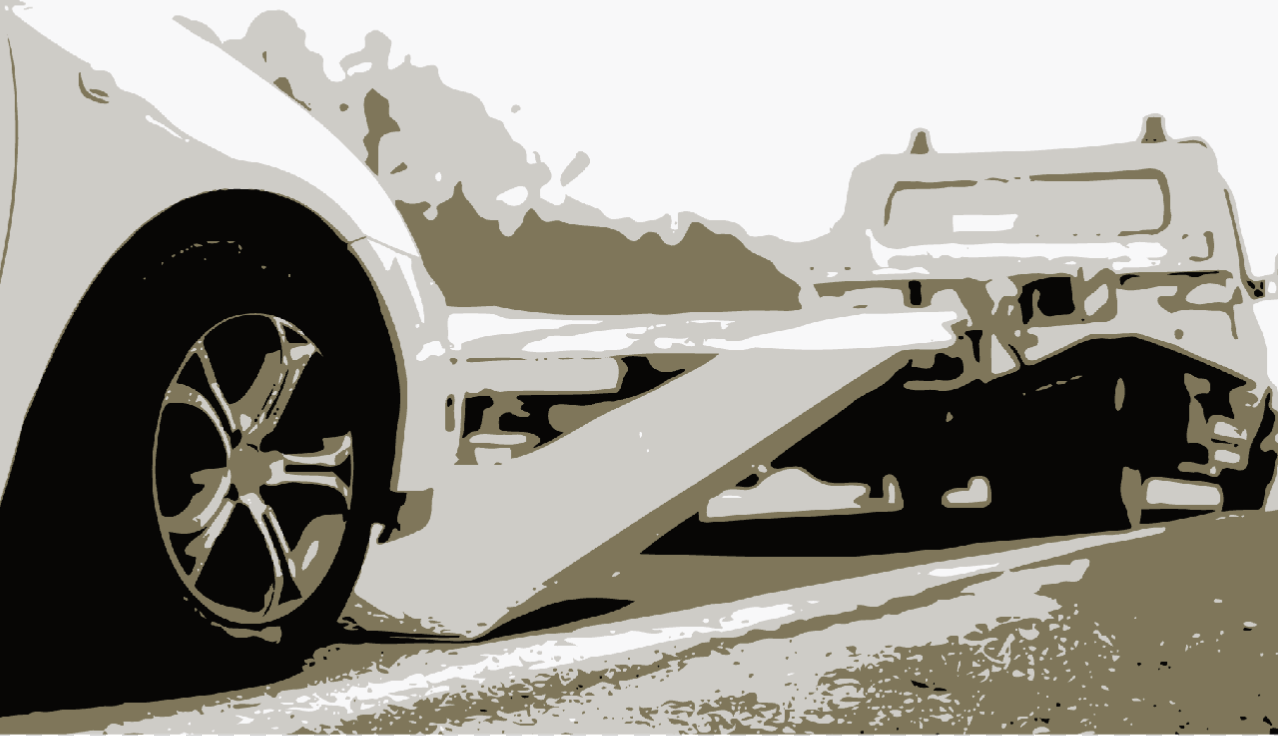 vector image of car loading onto tow truck for long distance towing